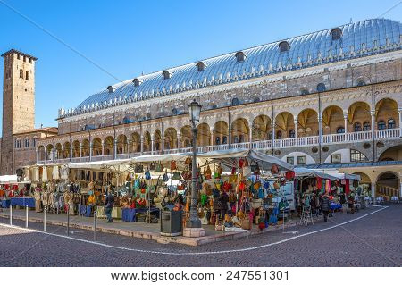 Padua, Italy - March 21, 2013:  The Della Ragione Palace Seen From Della Frutta Square With A Tradit