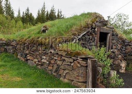 Stone Hut With Grass Roof In Reykholt. Iceland