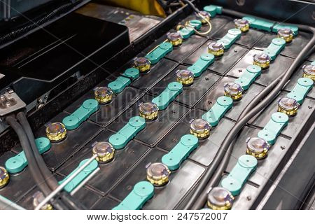 Powerful Rechargeable Battery Forklift. Contacts Of Electrolytic Cans Are Connected By Crosspieces.