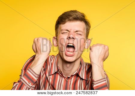 Tantrum Hysterics. Man Has A Hysterical Fit Screaming. Emotion Facial Expression And Feelings. Portr
