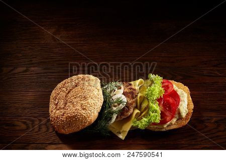 Flat Lay Of Delicious Fresh Home Made Burger With Piccoli, Lettuce, Cheese, Onion, Tomato, Dill And 