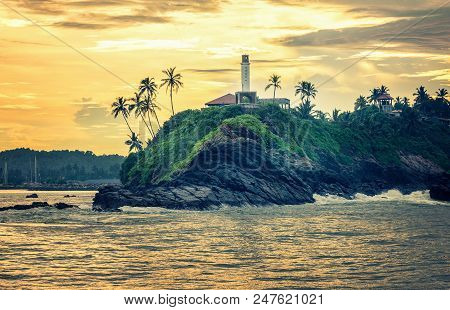 Lighthouse In Mirissa On The Background Of Sunset, Sri Lanka