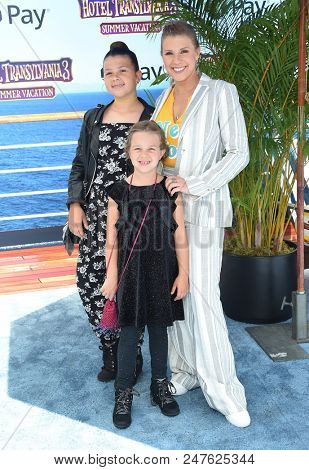 LOS ANGELES - JUN 30:  Jodie Sweetin, Beatrix Coyle and Zoie Herpin arrives to the 'Hotel Transylvania 3: Summer Vacation' World Premiere  on June 30, 2018 in Hollywood, CA                