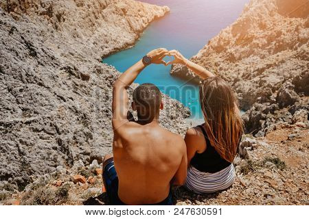 Chania , Greece - June 14, 2018 : A Young Couple Spotted Over Looking Beautiful  Seitan Limania Beac