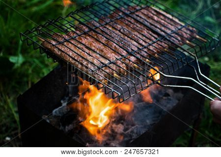 Lulya Kebab From Meat Are Prepared In The Grill. Shish Kebab In The Grill.
