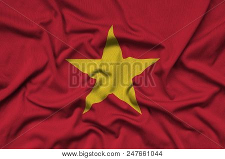 Vietnam Flag  Is Depicted On A Sports Cloth Fabric With Many Folds. Sport Team Waving Banner