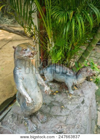 Two Otter Statue One Stand And One Crawl On The Floor In The Zoo Bangkok Thailand,otter Statue In Fr