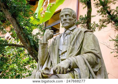PISA, ITALY - MAY 30, 2018: Paolo Savi, an Italian geologist and ornithologist memorial sculpture at Orto botanico di Pisa (Orto Botanico dell Universita di Pisa), the oldest university botanic garden