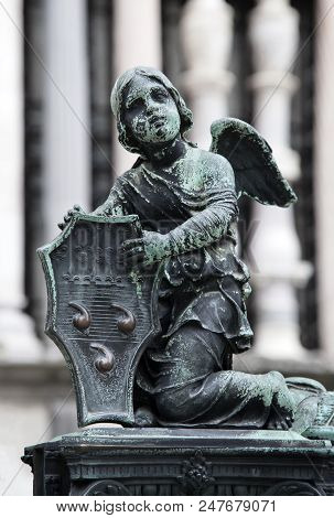 Sculpture Of An Angel Holding Coat Of Arms Of Colleoni Family, Bergamo, Italy
