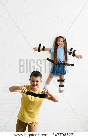 Disobedient Brother Glued Sister To Wall With Black Tape At Home