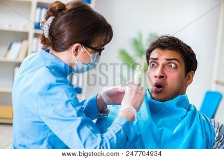 Patient afraid of dentist during doctor visit