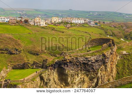 Tintagel, United Kingdom - May 02, 2014: View Of Tintagel Island And Legendary Tintagel Castle Ruins