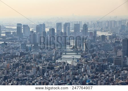 Tokyo City, Japan. Hazy Skyline Of Chuo Ward And Tsukishima Island.