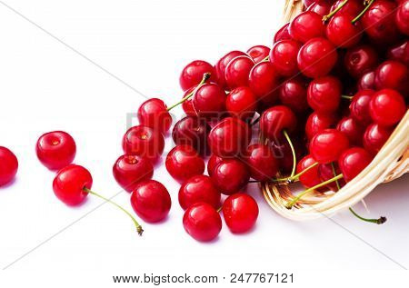 Red Ripe Cherry On A Background