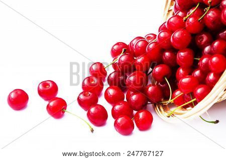 Red Ripe Cherry On A Background