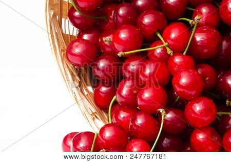 Red Ripe Cherry On A Background