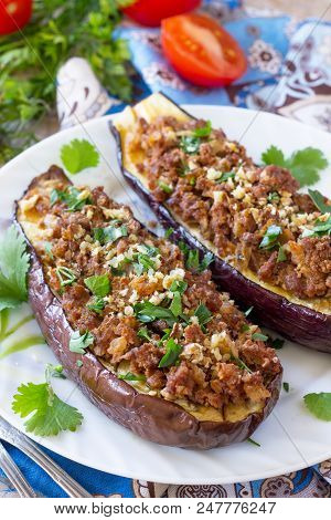 Classic Baked Eggplant Close-up With Meat, Walnut And Vegetables. Traditional Middle Eastern Or Arab