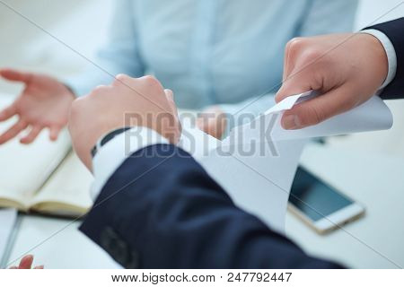 Breaking Contract. Furious Young Businessman Tearing Up Employment Contract.