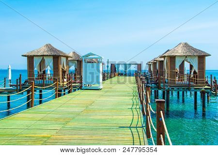 Wooden Beach Pavilions On The Shore Of A Sandy Beach - The Mediterranean Coast, Beldibi, Antalya, Tu