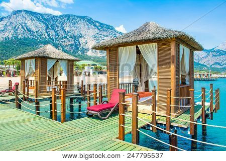 Wooden Beach Pavilions On The Shore Of A Sandy Beach - The Mediterranean Coast, Beldibi, Antalya, Tu