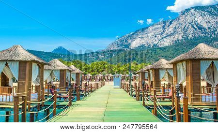 Wooden Beach Pavilions On The Shore Of A Sandy Beach - The Mediterranean Coast, Beldibi, Antalya, Tu