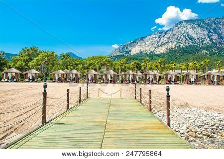 Wooden Beach Pavilions On The Shore Of A Sandy Beach - The Mediterranean Coast, Beldibi, Antalya, Tu