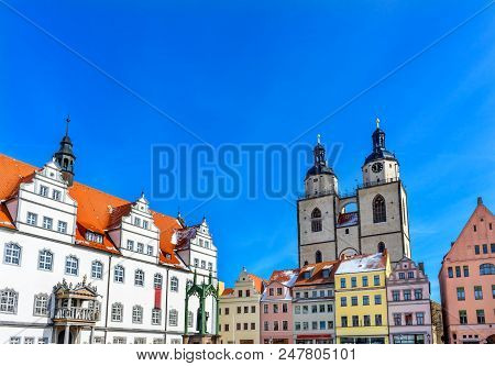 Martin Luther Statue Colorful Market Square Rathaus City Church Lutherstadt Wittenberg Germany. Stat