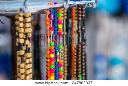 Traditional knitten and wooden beads