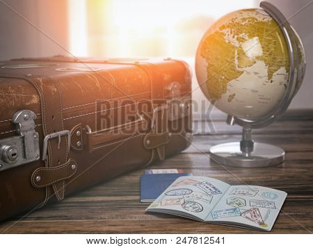 Travel or turism concept.  Old  suitcase  with open passport with visa stamps and globe. 3d illustration