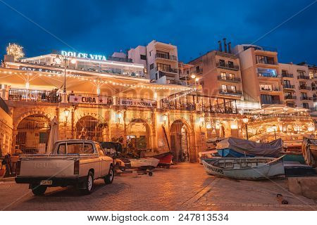 June 10, 2018. Valletta, Malta. Beautiful Night Evening In The Docs With Small Restaurants And Cafes