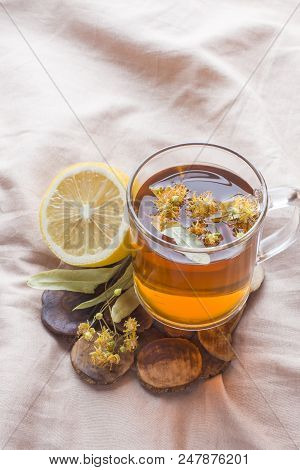 Tea With Linden, Honey And Lemon. The Tray On The Bed, The Concept Of The Treatment Of Colds