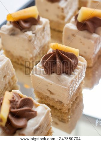 Wedding Cakes Set On Glass Shelf Minicake