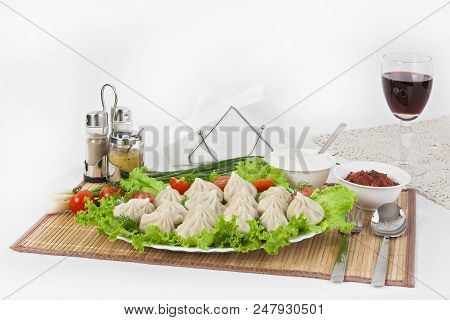 Kinkali In Green With Tomatoes And Onions. Serve With Soy Sauce And Sour Cream.