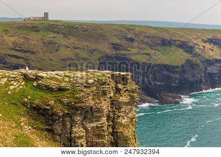 View Of Tintagel Island And St Materiana's Church In The Background.