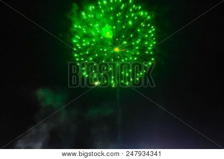 Beautiful Firework On Night Sky,green Light Firework In Festival