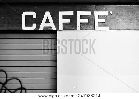 Vintage sign board of a closed cafe in Venice, Italy. Caffe (it.): cafe, coffee