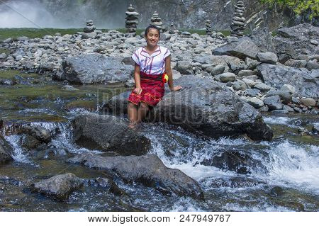 Batad, Philippines - May 02 : Girl From Ifugao Minority Near A Waterfall In Batad The Philippines On