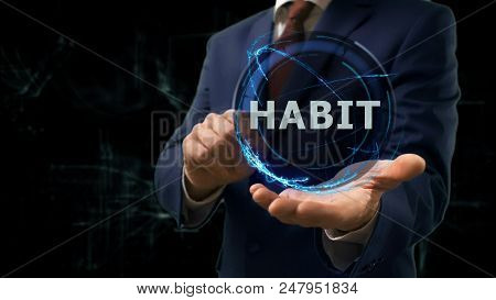 Businessman Shows Concept Hologram Habit On His Hand. Man In Business Suit With Future Technology Sc