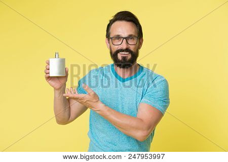 Right Perfume Fragrance Makes You Younger. Man Bearded Handsome Smiling Face Hold Bottle Perfume Def