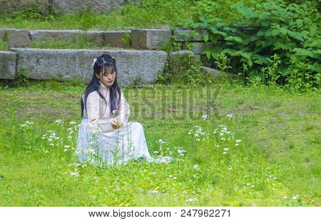 Seoul - May 10 : Korean Woman Wearing Hanbok Dress In Seoul Korea On May 10 2018. Hanbok Is A Korean