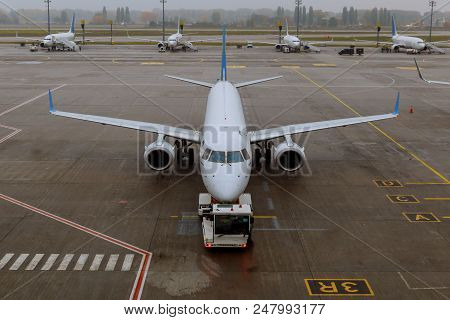 Planes Undergo Preflight Service In The International Airport Airplanes