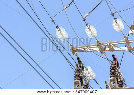 Close-up Of A Power Line Against The Sky