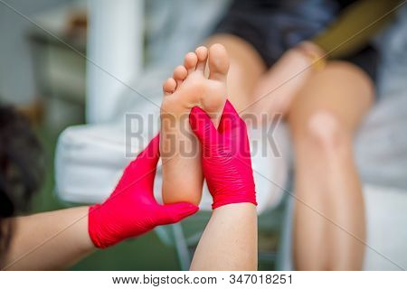 Podiatrist Treating Toenail Fungus. Podology Treatment. Close-up.