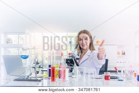 Pretty Scientist Work Reserching In Chemical Laboratory, Science And Healthy Or Medical Concept
