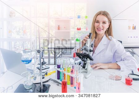 Pretty Scientist Work Reserching In Chemical Laboratory, Science And Healthy Or Medical Concept