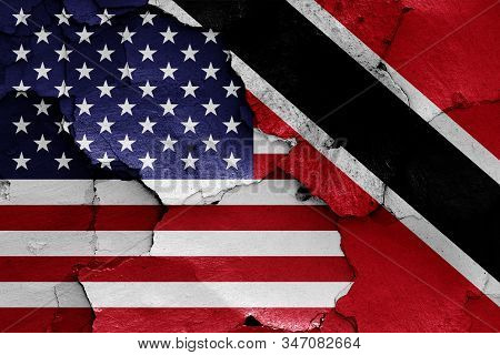 Flags Of Usa And Trinidad And Tobago Painted On Cracked Wall