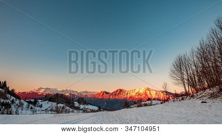 Winter Sunset In The Julian Alps