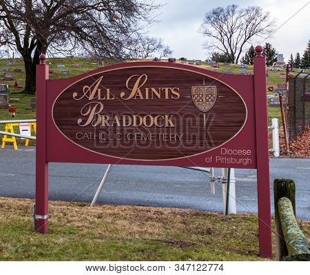 Braddock Hills, Pennsylvania, Usa 1/25/20 The Sign At The Entrance To The All Saints Braddock Cathol