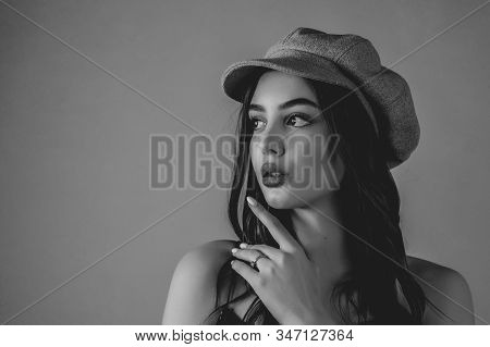 Profile. Girl In Profile Biret Looks Into The Distance Color Filter Pink Background. Brunette In A H