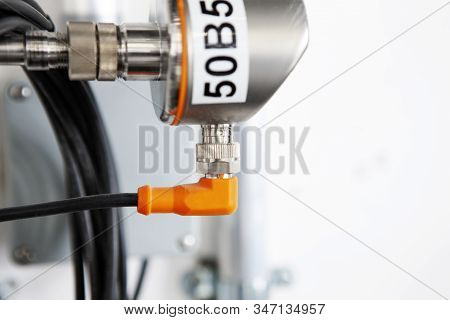 Chrome Pipes In Heating And Ac Rooms In Buildings Of Factories And Hospital. With Orange Conector